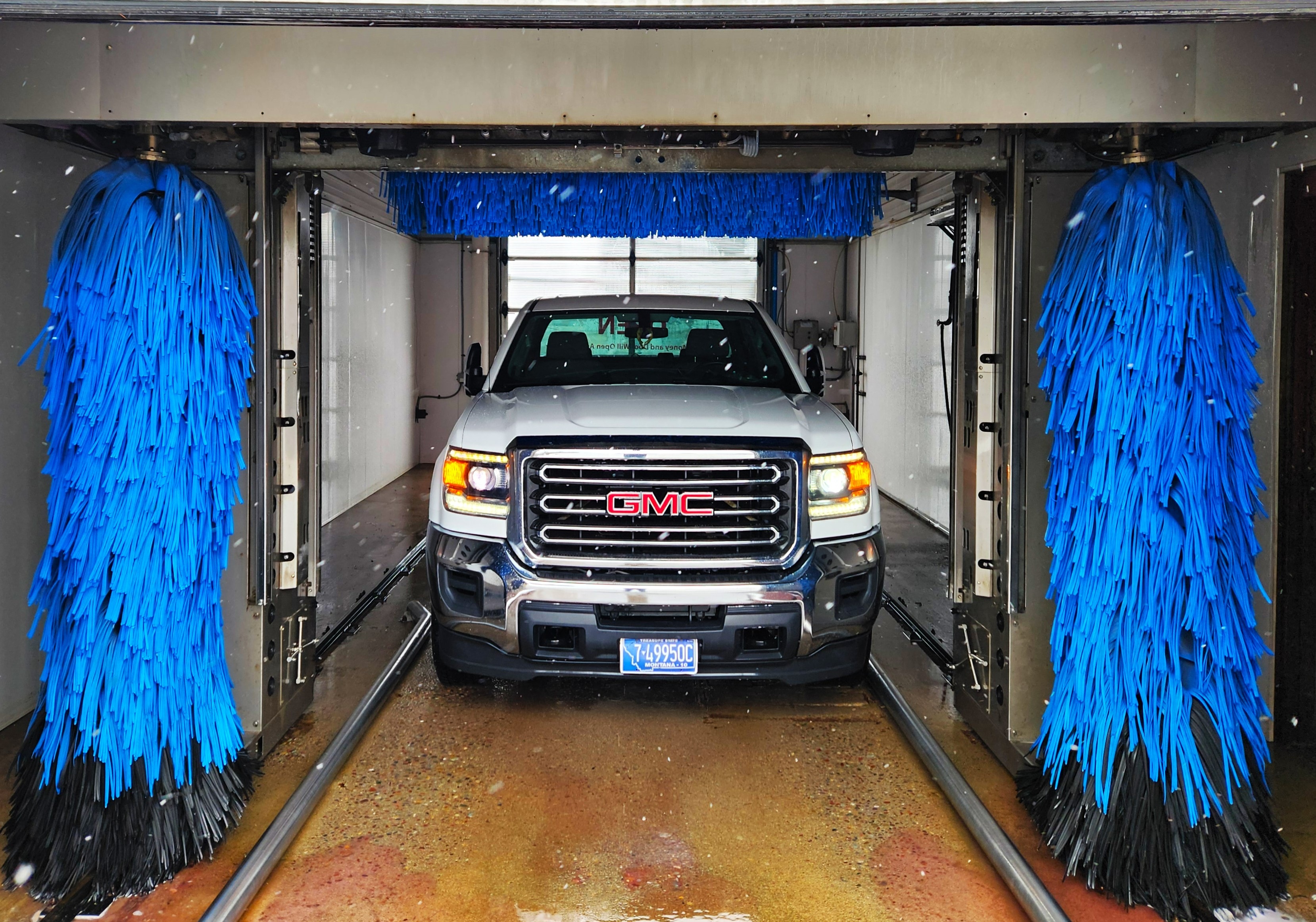 In-bay automatic car wash